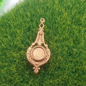 Ornate Gold Tone Pendant P335